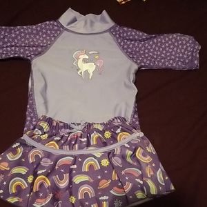 If skinz bathing suit with matching reversible hat